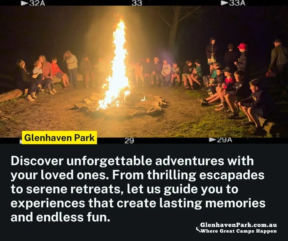 Glenhaven Park Camps A large group of people sits around a bright bonfire at night, engaging in conversation. The text on the image promotes Glenhaven Park, emphasizing adventure and lasting memories at their school camps, fostering wellbeing and supporting teachers' growth.